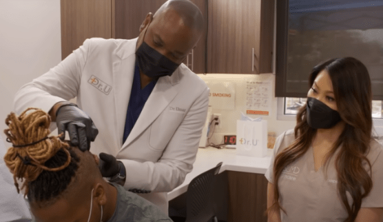 Dr. Umar sees Robert’s keloid in person for the first time. On the right: Dr. Sandra Lee, AKA Dr. Pimple Popper.*