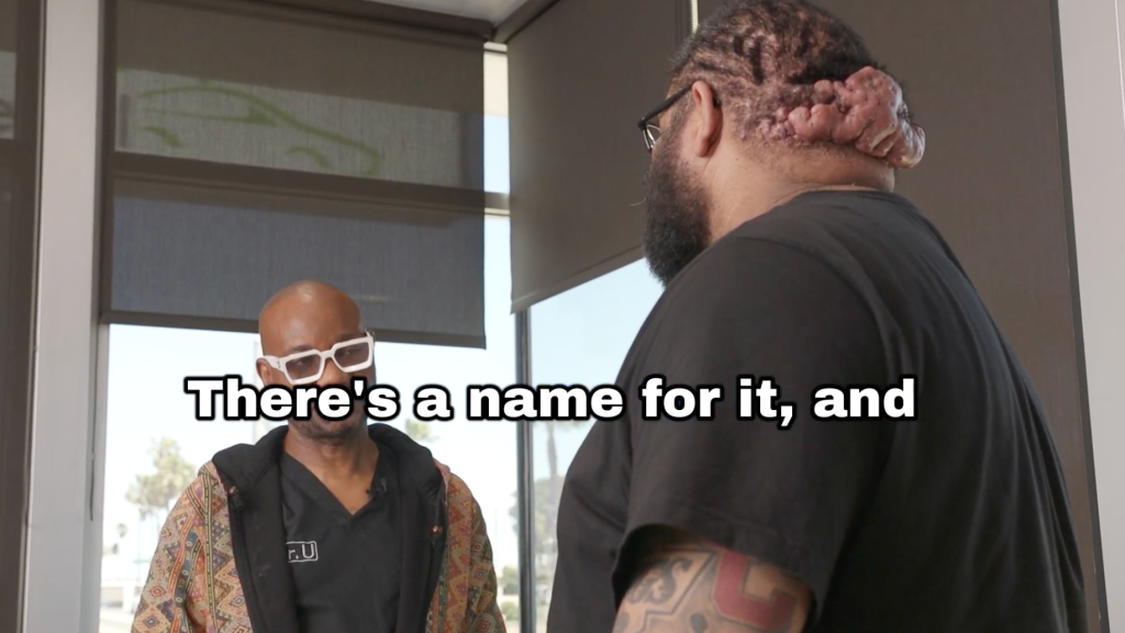 Dr. Sanusi Umar carefully examines John’s scalp and identifies the underlying scalp conditions during consultation.